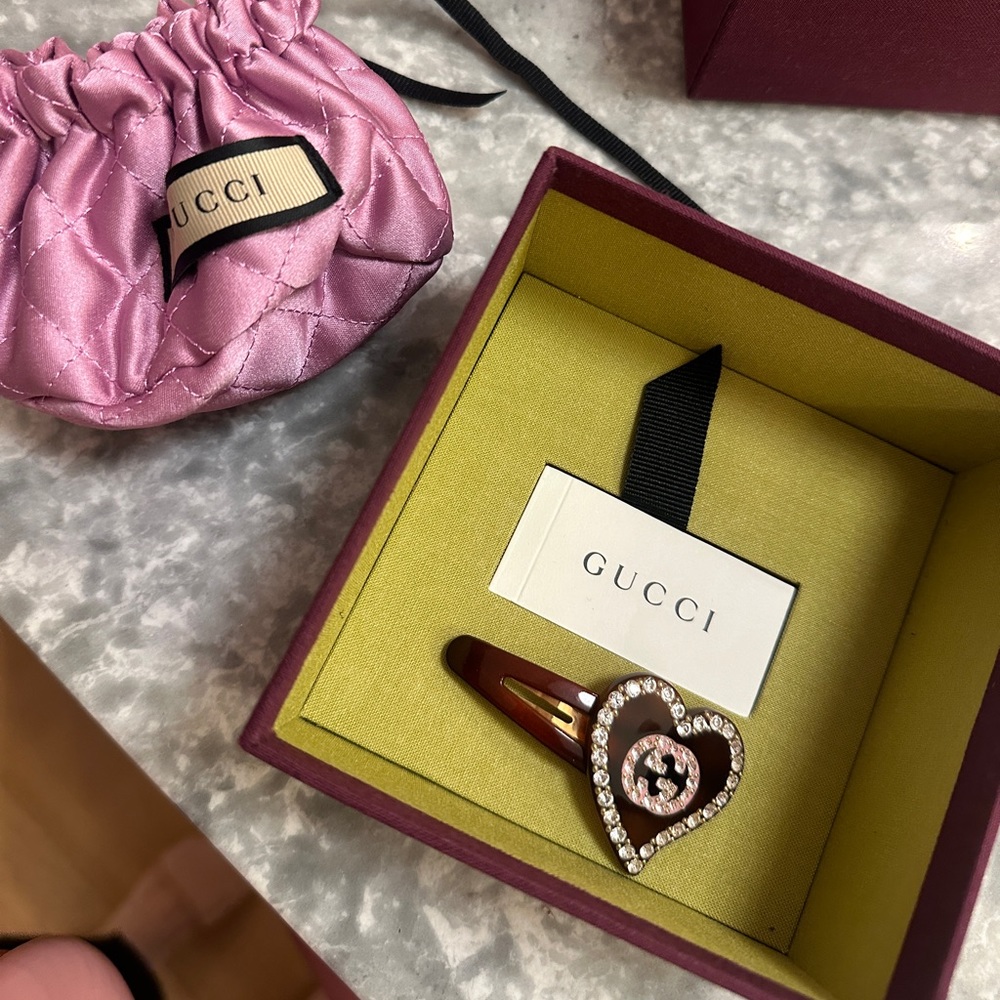 Barely used Gucci Logo Plaque Embellished Heart Hair Clip.